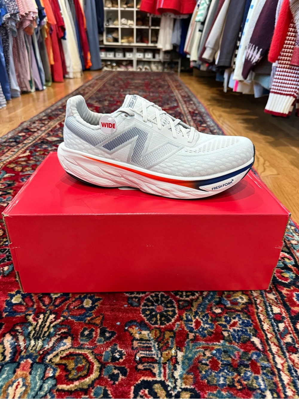 New Balance Men’s White Athletic Running Shoe with Orange Accent